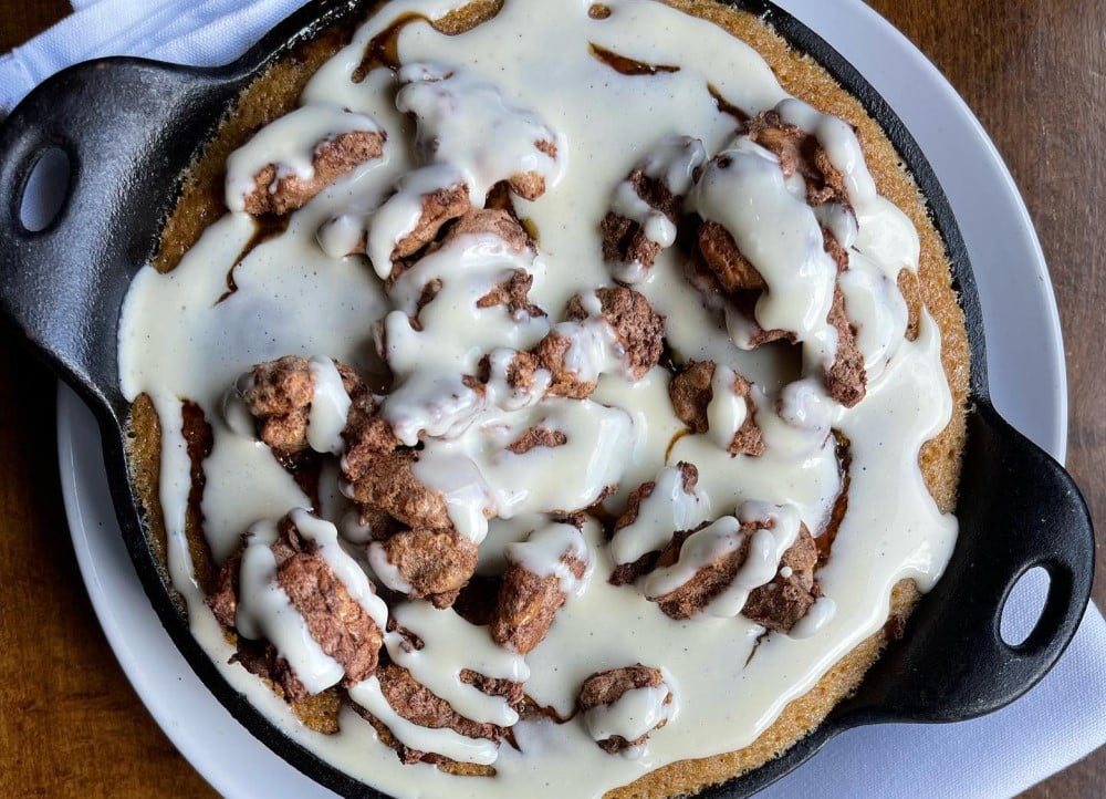 Sticky Toffee Carrot Cake, finished with cream cheese anglaise and spiced maple walnuts