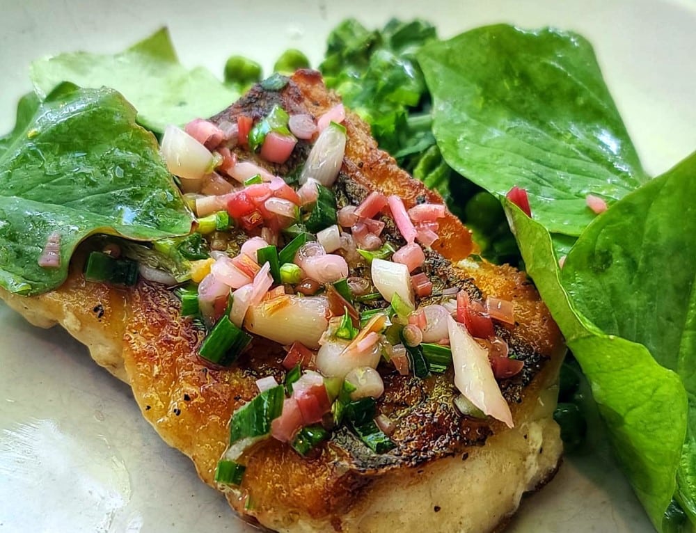 Golden Tilefish with ramp pistou Vinaigrette, sugar snap peas, green chickpeas and miners lettuce